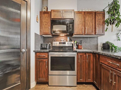 32-351 Monteith Drive Se, High River, AB - Indoor Photo Showing Kitchen