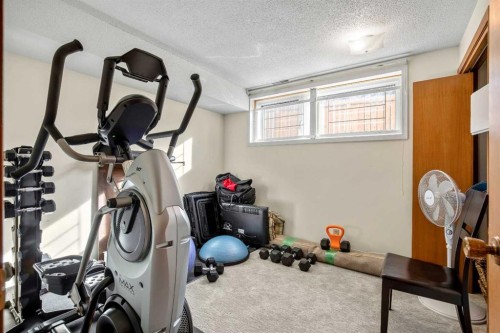 5711 Dalmead Crescent Nw, Calgary, AB - Indoor Photo Showing Gym Room