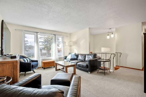 5711 Dalmead Crescent Nw, Calgary, AB - Indoor Photo Showing Living Room