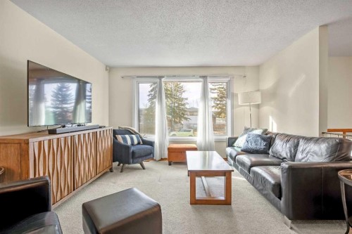 5711 Dalmead Crescent Nw, Calgary, AB - Indoor Photo Showing Living Room