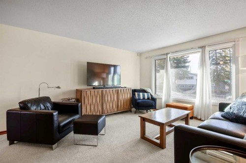 5711 Dalmead Crescent Nw, Calgary, AB - Indoor Photo Showing Living Room