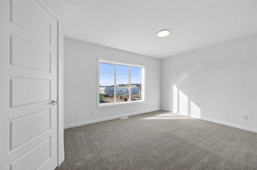 32 Red Embers Plaza Ne, Calgary, AB - Indoor Photo Showing Other Room