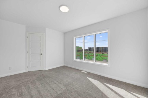 32 Red Embers Plaza Ne, Calgary, AB - Indoor Photo Showing Other Room
