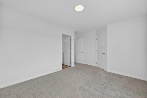 32 Red Embers Plaza Ne, Calgary, AB - Indoor Photo Showing Other Room