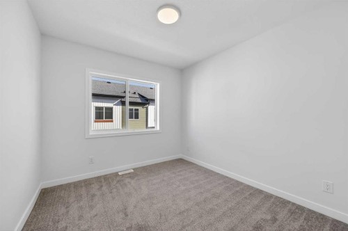 32 Red Embers Plaza Ne, Calgary, AB - Indoor Photo Showing Other Room