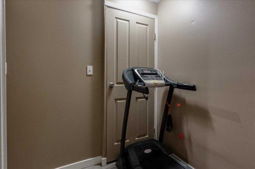 5929 West Park Crescent, Red Deer, AB - Indoor Photo Showing Gym Room