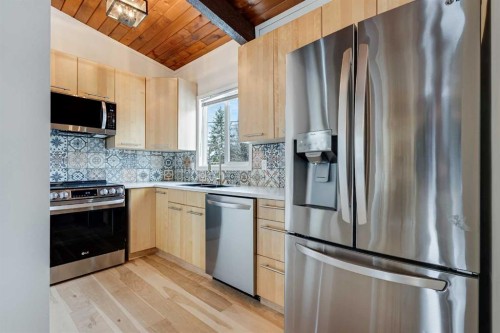 120 Oaktree Lane Sw, Calgary, AB - Indoor Photo Showing Kitchen With Stainless Steel Kitchen