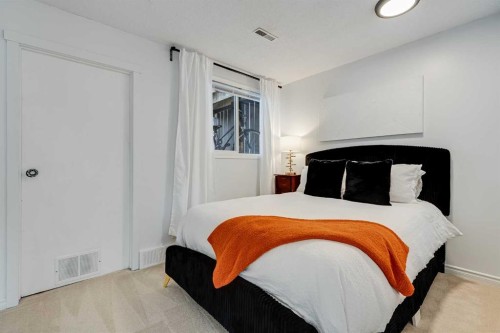 120 Oaktree Lane Sw, Calgary, AB - Indoor Photo Showing Bedroom