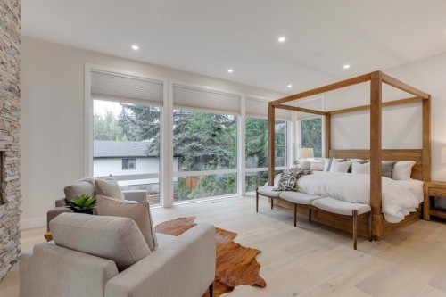 1307 Hamilton Street Nw, Calgary, AB - Indoor Photo Showing Living Room With Fireplace