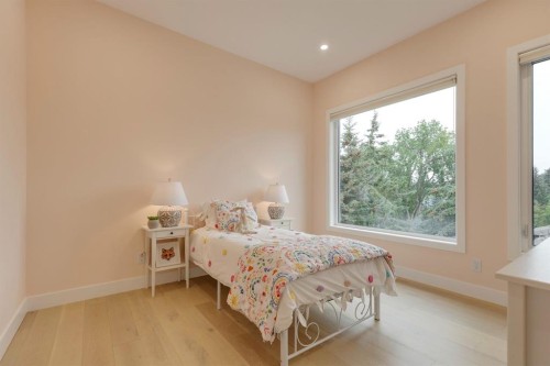 1307 Hamilton Street Nw, Calgary, AB - Indoor Photo Showing Bedroom