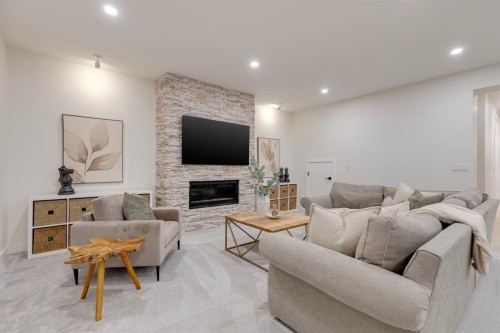 1307 Hamilton Street Nw, Calgary, AB - Indoor Photo Showing Living Room With Fireplace
