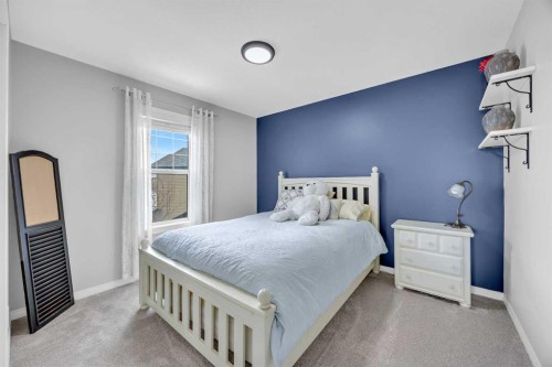 114 Morningside Circle Sw, Airdrie, AB - Indoor Photo Showing Bedroom