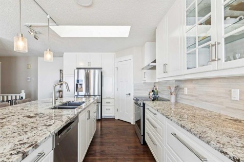 642 Schooner Cove Nw, Calgary, AB - Indoor Photo Showing Kitchen With Stainless Steel Kitchen With Double Sink With Upgraded Kitchen