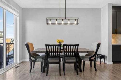 96 Emberside Glen, Cochrane, AB - Indoor Photo Showing Dining Room