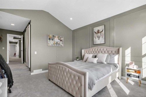 96 Emberside Glen, Cochrane, AB - Indoor Photo Showing Bedroom