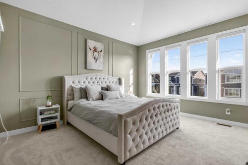 96 Emberside Glen, Cochrane, AB - Indoor Photo Showing Bedroom