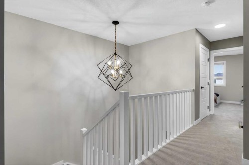 96 Emberside Glen, Cochrane, AB - Indoor Photo Showing Other Room