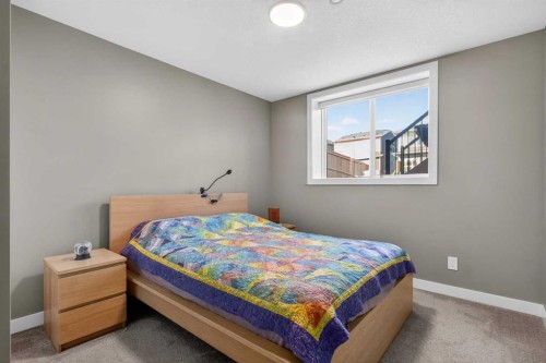 96 Emberside Glen, Cochrane, AB - Indoor Photo Showing Bedroom