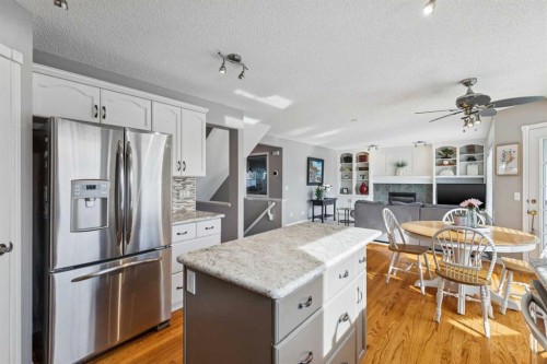 420 Rocky Ridge Bay Nw, Calgary, AB - Indoor Photo Showing Kitchen With Upgraded Kitchen
