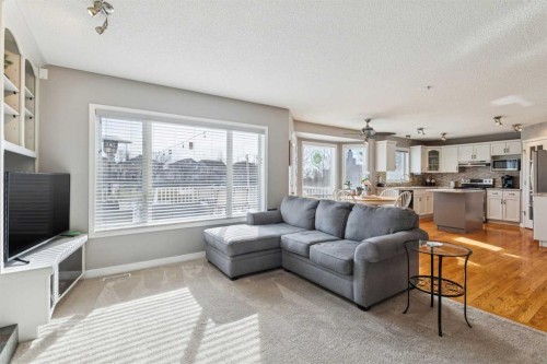 420 Rocky Ridge Bay Nw, Calgary, AB - Indoor Photo Showing Living Room