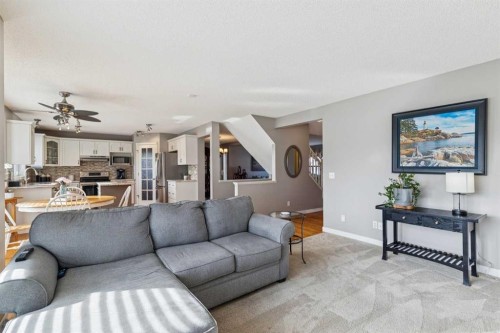 420 Rocky Ridge Bay Nw, Calgary, AB - Indoor Photo Showing Living Room