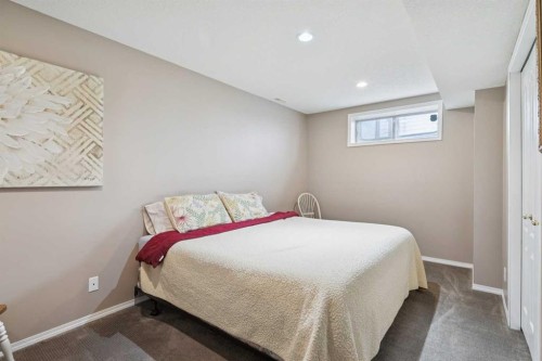 420 Rocky Ridge Bay Nw, Calgary, AB - Indoor Photo Showing Bedroom