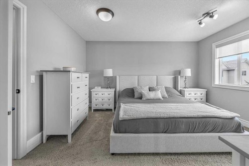 26-351 Monteith Drive Se, High River, AB - Indoor Photo Showing Bedroom