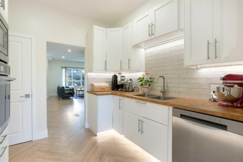1032 18 Avenue Se, Calgary, AB - Indoor Photo Showing Kitchen With Double Sink