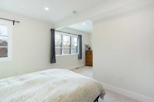 1032 18 Avenue Se, Calgary, AB - Indoor Photo Showing Bedroom