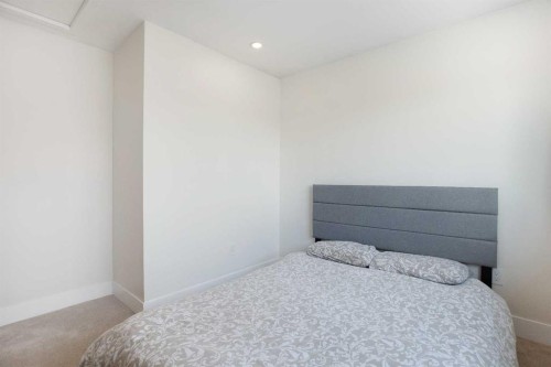 1032 18 Avenue Se, Calgary, AB - Indoor Photo Showing Bedroom