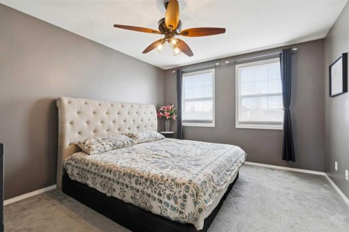 27 Everstone Way Sw, Calgary, AB - Indoor Photo Showing Bedroom