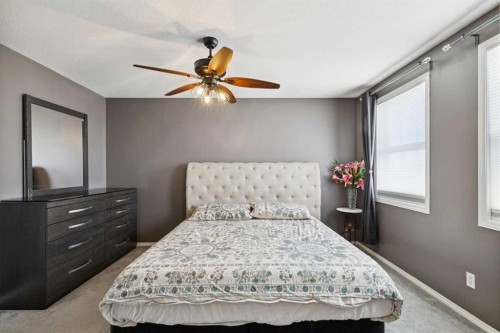 27 Everstone Way Sw, Calgary, AB - Indoor Photo Showing Bedroom