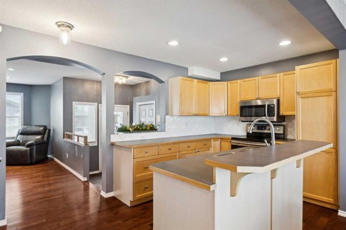 27 Everstone Way Sw, Calgary, AB - Indoor Photo Showing Kitchen With Double Sink