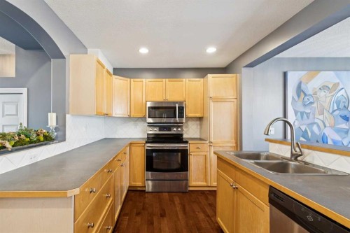 27 Everstone Way Sw, Calgary, AB - Indoor Photo Showing Kitchen With Double Sink