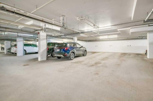 402-8531 8A Avenue Sw, Calgary, AB - Indoor Photo Showing Garage