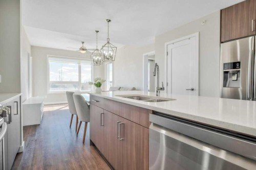 402-8531 8A Avenue Sw, Calgary, AB - Indoor Photo Showing Kitchen With Double Sink With Upgraded Kitchen