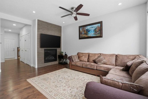 154 Saddlelake Way Ne, Calgary, AB - Indoor Photo Showing Living Room With Fireplace