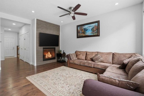 154 Saddlelake Way Ne, Calgary, AB - Indoor Photo Showing Living Room With Fireplace