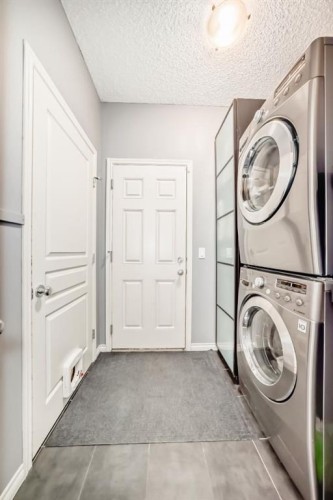44 Aspen Hills Close Sw, Calgary, AB - Indoor Photo Showing Laundry Room