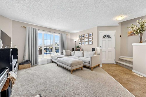 336 Cranberry Circle Se, Calgary, AB - Indoor Photo Showing Living Room