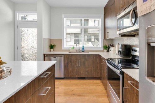 1206 Sage Meadows Gardens Nw, Calgary, AB - Indoor Photo Showing Kitchen With Upgraded Kitchen