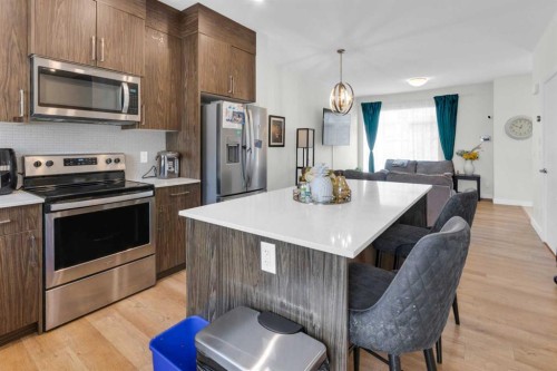 1206 Sage Meadows Gardens Nw, Calgary, AB - Indoor Photo Showing Kitchen With Upgraded Kitchen