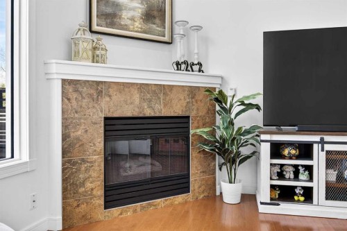 94 Candle Terrace Sw, Calgary, AB - Indoor With Fireplace