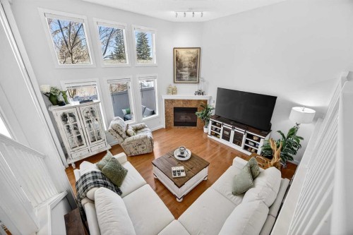 94 Candle Terrace Sw, Calgary, AB - Indoor Photo Showing Living Room With Fireplace