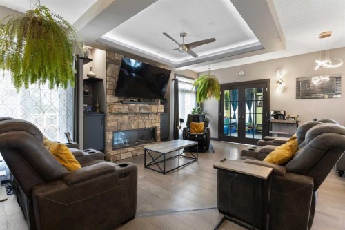 670 Muirfield Crescent, Lyalta, AB - Indoor Photo Showing Living Room With Fireplace