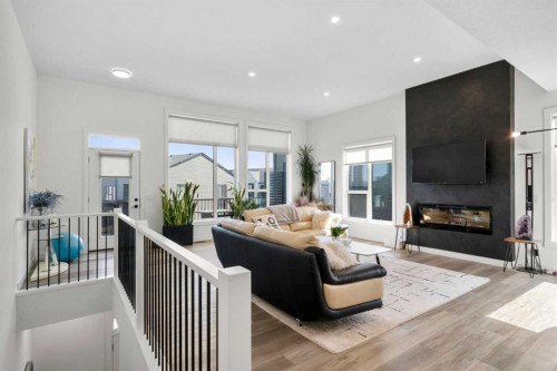 244 Sovereign Common Sw, Calgary, AB - Indoor Photo Showing Living Room With Fireplace