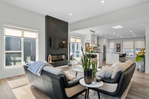 244 Sovereign Common Sw, Calgary, AB - Indoor Photo Showing Living Room With Fireplace