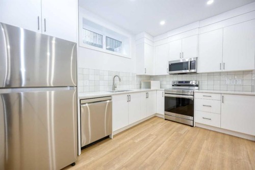 2008 26A Street Sw, Calgary, AB - Indoor Photo Showing Kitchen With Upgraded Kitchen