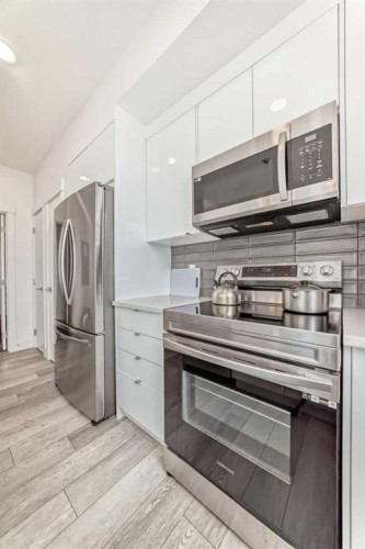 3112-410 Seton Passage Se, Calgary, AB - Indoor Photo Showing Kitchen With Stainless Steel Kitchen