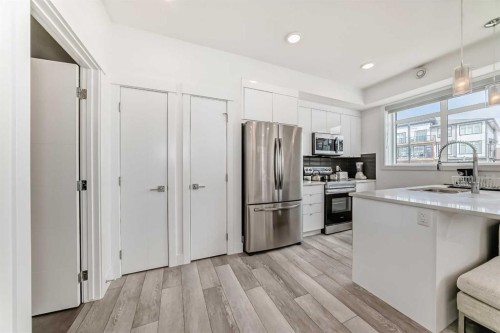 3112-410 Seton Passage Se, Calgary, AB - Indoor Photo Showing Kitchen With Stainless Steel Kitchen